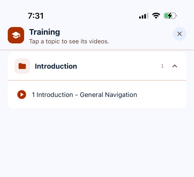 The Training screen listing topics, with an Introduction topic expanded to show a General Navigation video.
